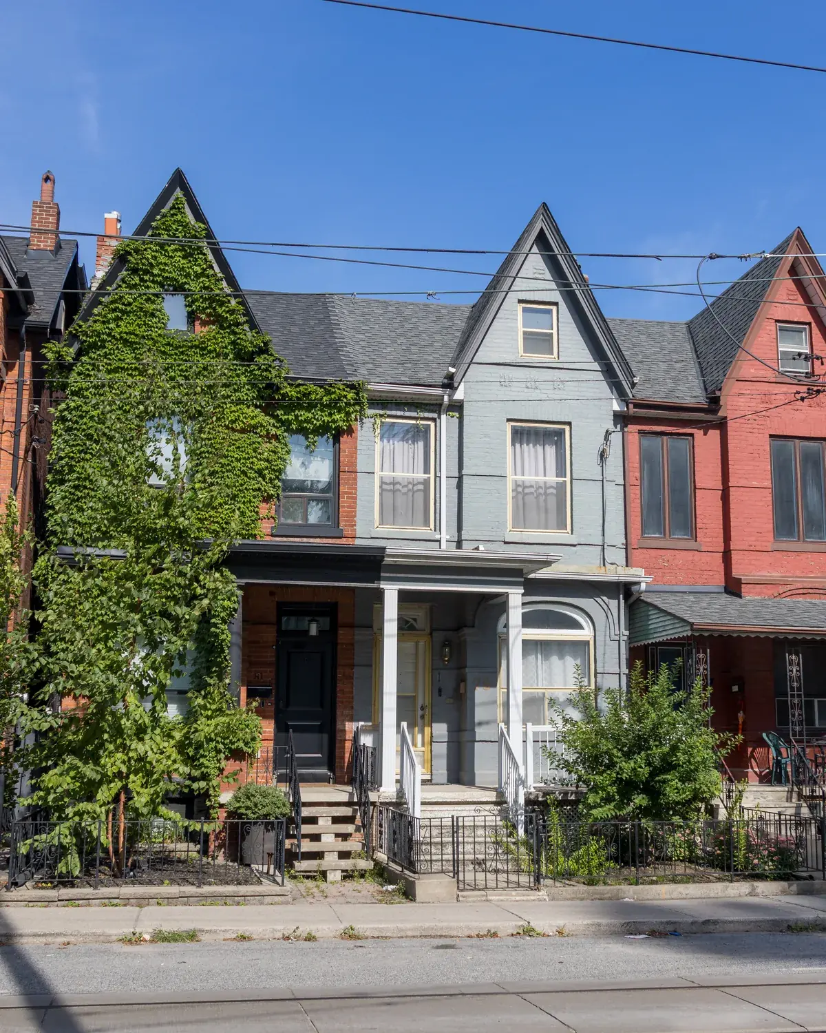 Row of three attached homes on Shaw Street, Toronto