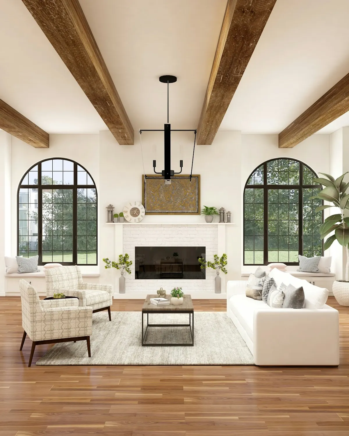 Staged living room with a white sofa, fireplace and arched windows in daylight